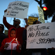 Black Lives Matter protesters hold candles during a vigil and demonstration on March 23, 2018 in Sacramento, California.